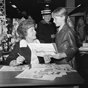 Phyllis Calvert, English film, stage and television actress signing copies of her new LP