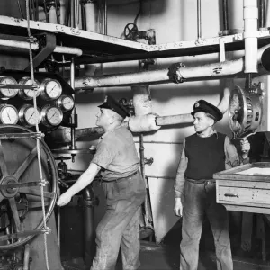 Picture shows 2nd Engineer T Dorman and 3rd Engineer Hughes