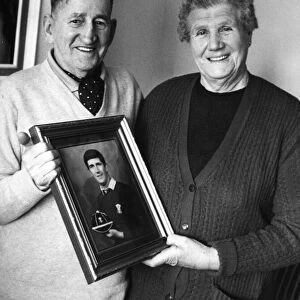 Picture shows Bryn and Evelyn Mainwaring, with a picture of son Billy