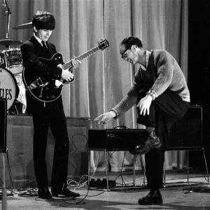 Picture shows George Harrison. The Beatles rehearse at The Prince of Wales Theatre