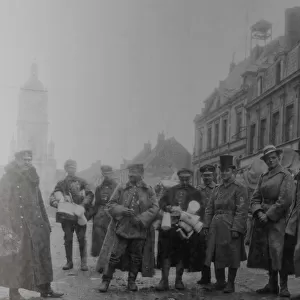 Picture shows German soldiers in Lens in 1915 standing in the main street by the Town