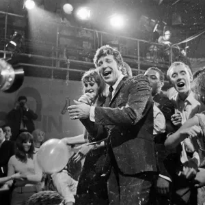 Print of Tom Jones in a pillow fight scene