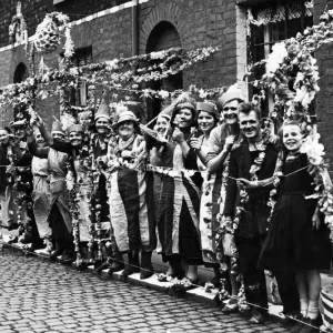 Print of a photograph showing residents celebrating the coronation Print of a photograph showing residents celebrating the coronation
