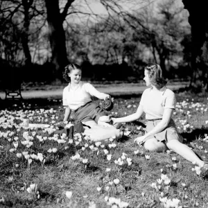 Picture show two young ladies enjoying the sunshine in the summer of 1948 Picture show two young ladies enjoying the sunshine in the summer of 1948