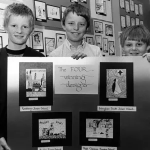 Pictured with the four winning designs in a Christmas card competition at Brunner Pictured with the four winning designs in a Christmas card competition at Brunner