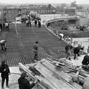 Pictured, workmen put last minute touches to a section of the M6 Gravelly Hill Pictured, workmen put last minute touches to a section of the M6 Gravelly Hill