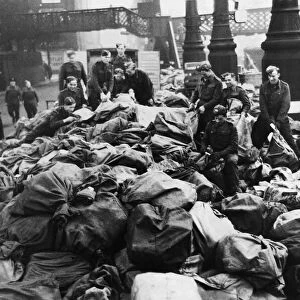 Piles of mail bags sorted by soldiers in Liverpool. 19th December 1943