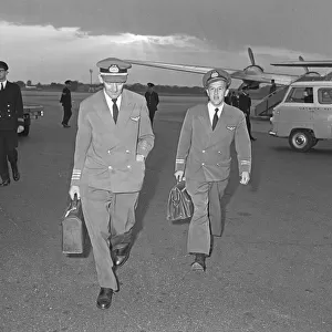 The pilot and flight engineer of Overseas Aviation walk towards the terminal at Gatwick