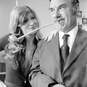 Pipe smoking Champion Robert Locke of Hayes, Middlesex, is pursued by typist Liliana