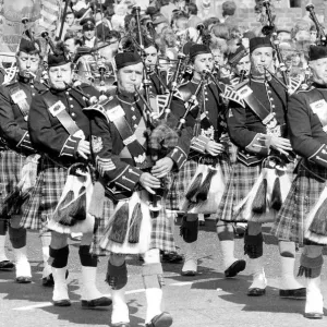 Pipers marching pas the Royal County Hotel in Durham during the Durham Miners Gala in