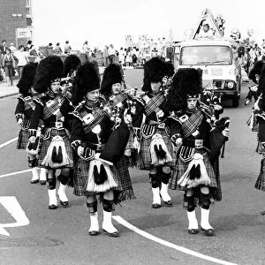 The pipes and drums of the 72 Royal Engineers (V) from Gateshead in a carnival procession