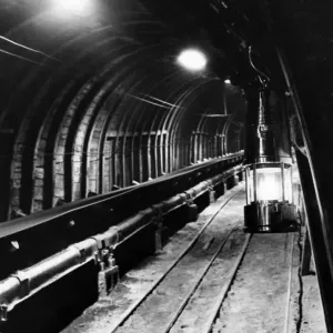 Pit tunnel showing conveyer belt and a Davey lamp at a coal mine in Newstead Pit tunnel showing conveyer belt and a Davey lamp at a coal mine in Newstead