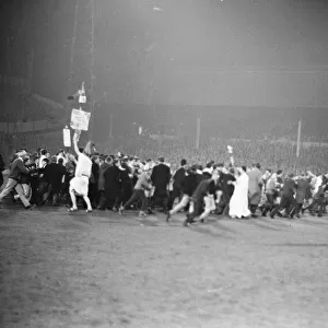 A pitch invasion after the Tottenham Hotspur v Gornik Zabrze European Cup tie played at