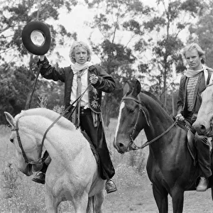 The Police, pop / rock group, pictured on horses. Left is guitarist Andy