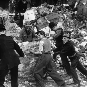 Print of Policeman in Short Sleeves Moving a Rock Amid Wreckage