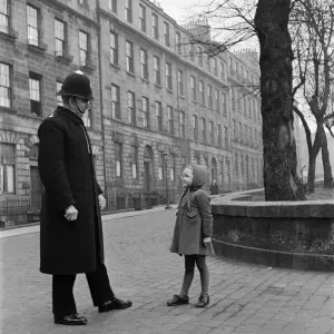 A policeman talking to a small girl, Edinburgh, 1945 A policeman talking to a small girl, Edinburgh, 1945
