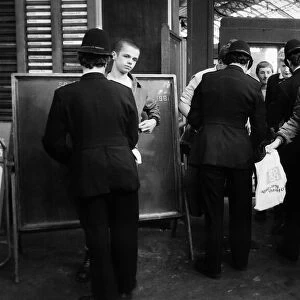 Policemen searching Skinheads at Brighton station 1981
