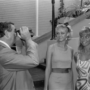 Denis Healey with models, a Polaroid print from 1986