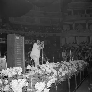 Pop Concert at Albert Hall. Adrian Henri, poet and singer with Pop Concert at Albert Hall. Adrian Henri, poet and singer with