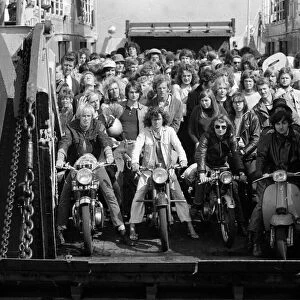 Pop fans leaving the ferry on arrival at The Isle of Wight. 28th August 1970
