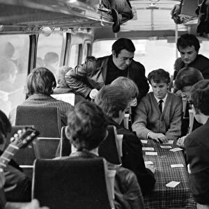 Pop group The Fourmost on tour A game of cards for members of the band