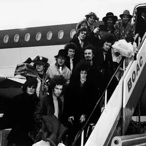 Pop groups including The Jimi Hendrix Experience and The Byrds standing outside aeroplane Pop groups including The Jimi Hendrix Experience and The Byrds standing outside aeroplane
