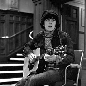 Pop singer Donovan waits in the lounge of the BBC television theatre in Shepherd