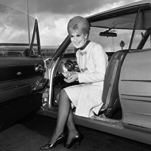 Pop singer Dusty Springfield at London airport before leaving for New York April