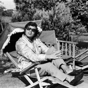 Pop singer Englebert Humperdinck relaxing in the garden of his county house near Great Pop singer Englebert Humperdinck relaxing in the garden of his county house near Great