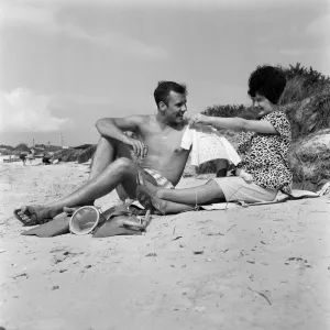 Black and white Print of Marty Wilde and Joyce on the beach at Shell Bay, Dorset Black and white Print of Marty Wilde and Joyce on the beach at Shell Bay, Dorset