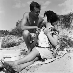 Pop singer Marty Wilde and his 19-year-old wife Joyce on the beach at Shell Bay, Dorset