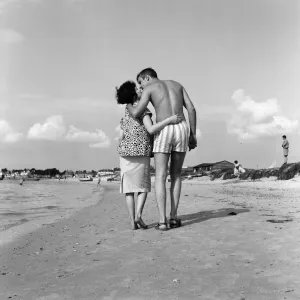 Pop singer Marty Wilde and his 19-year-old wife Joyce on the beach at Shell Bay, Dorset