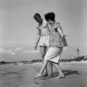 Pop singer Marty Wilde and his 19-year-old wife Joyce on the beach at Shell Bay, Dorset
