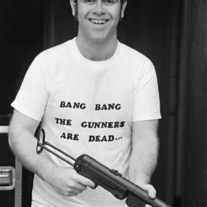 Pop star Elton John, also Chairman of Watford FC, pictured in Los Angeles giving his