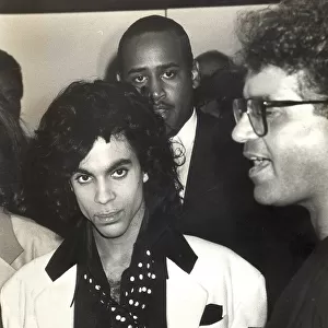 POP STAR PRINCE UNDER PROTECTION AT HEATHROW AIPORT, JUNE 1988