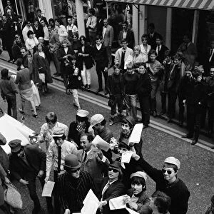 Pop stars meet in Carnaby Street, London to become founder members of an anti bowlerhat