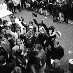 Pop stars meet in Carnaby Street, London to become founder members of an anti bowler hat Pop stars meet in Carnaby Street, London to become founder members of an anti bowler hat