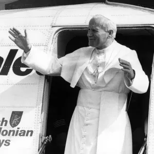 Pope John Paull IIs visit to Coventry. The Holy Father steps out of the plane