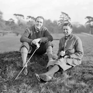 Pope Stampers and Owen Hares Golf May 1919 The two golfers sit down during a