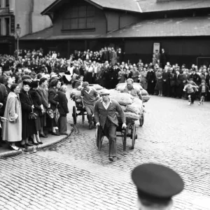 Porters from Covent Garden Flower and Vegetable market race their carts around Porters from Covent Garden Flower and Vegetable market race their carts around