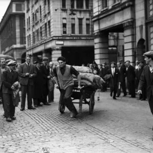 Porters from Covent Garden Flower and Vegetable market race their carts around Porters from Covent Garden Flower and Vegetable market race their carts around