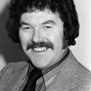 Portrait of Dickie Davies, television sports commentator. February 1976 Portrait of Dickie Davies, television sports commentator. February 1976