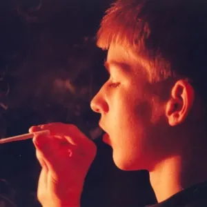 Print of a posed underage smoker from 1990