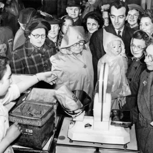 Post World War Two - Second World War - A crowd gathers at the biscuit counter of Post World War Two - Second World War - A crowd gathers at the biscuit counter of
