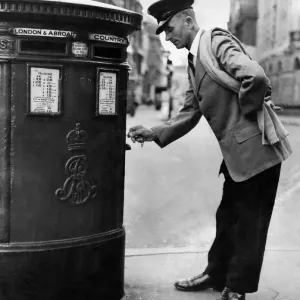 Postman Leslie White in Summer Jacket Print, July 1955