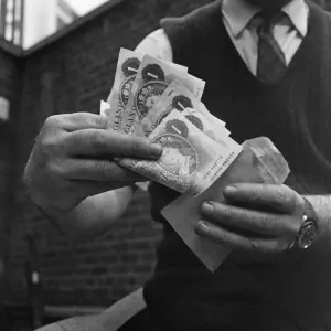 One Pound Notes in 1968. Pictures originally taken for a consumer