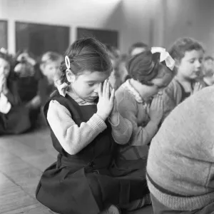 Prayers during morning assembly at the South Mead School, Southfield, Wimbledon Prayers during morning assembly at the South Mead School, Southfield, Wimbledon