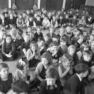 Prayers during morning assembly at the South Mead School, Southfield, Wimbledon Prayers during morning assembly at the South Mead School, Southfield, Wimbledon