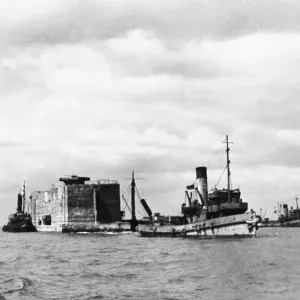 Prefabricated Ports Print: Concrete sections in tow