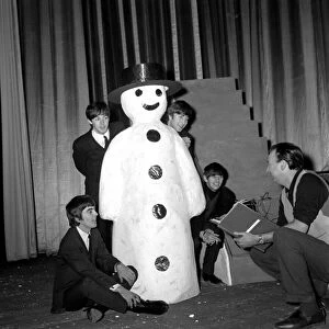 Preparations ahead of The Beatles 1963 Christmas Shows. The Beatles pose with a